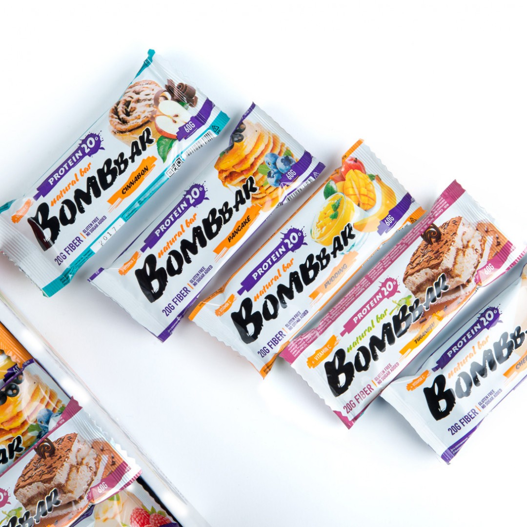 Bombbar шоколад протеиновый батончик. Протеиновый батончик Bombbar. Protein Bar батончик Bombbar. Bombbar протеиновый батончик 60 г. Bombbar батончик Bombbar 60 гр шоколад.